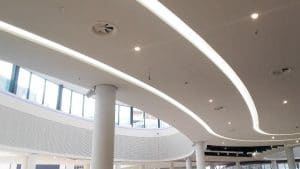 AX6 Adjustable Round Swirl Diffuser Installed in Gallery With High Ceilings