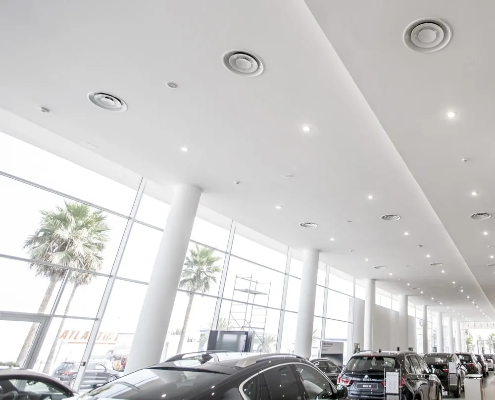DCG 3 Cone Aluminum Round Diffuser Installed in BMW Dealership's Ceiling